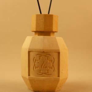 Hero image of our sandstone fragrance diffuser. Crafted to reinterpret the original sand texture, our diffusers are crafted in Bordeaux.